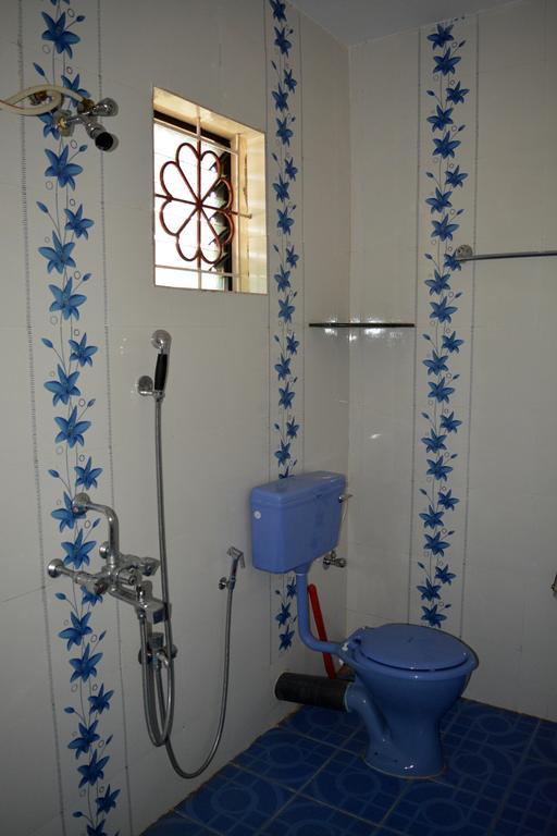 Vailankanni Guesthouse Morjim Szoba fotó