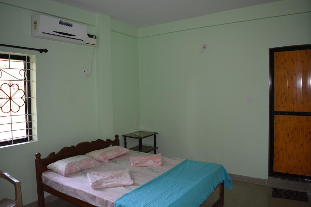 Vailankanni Guesthouse Morjim Szoba fotó